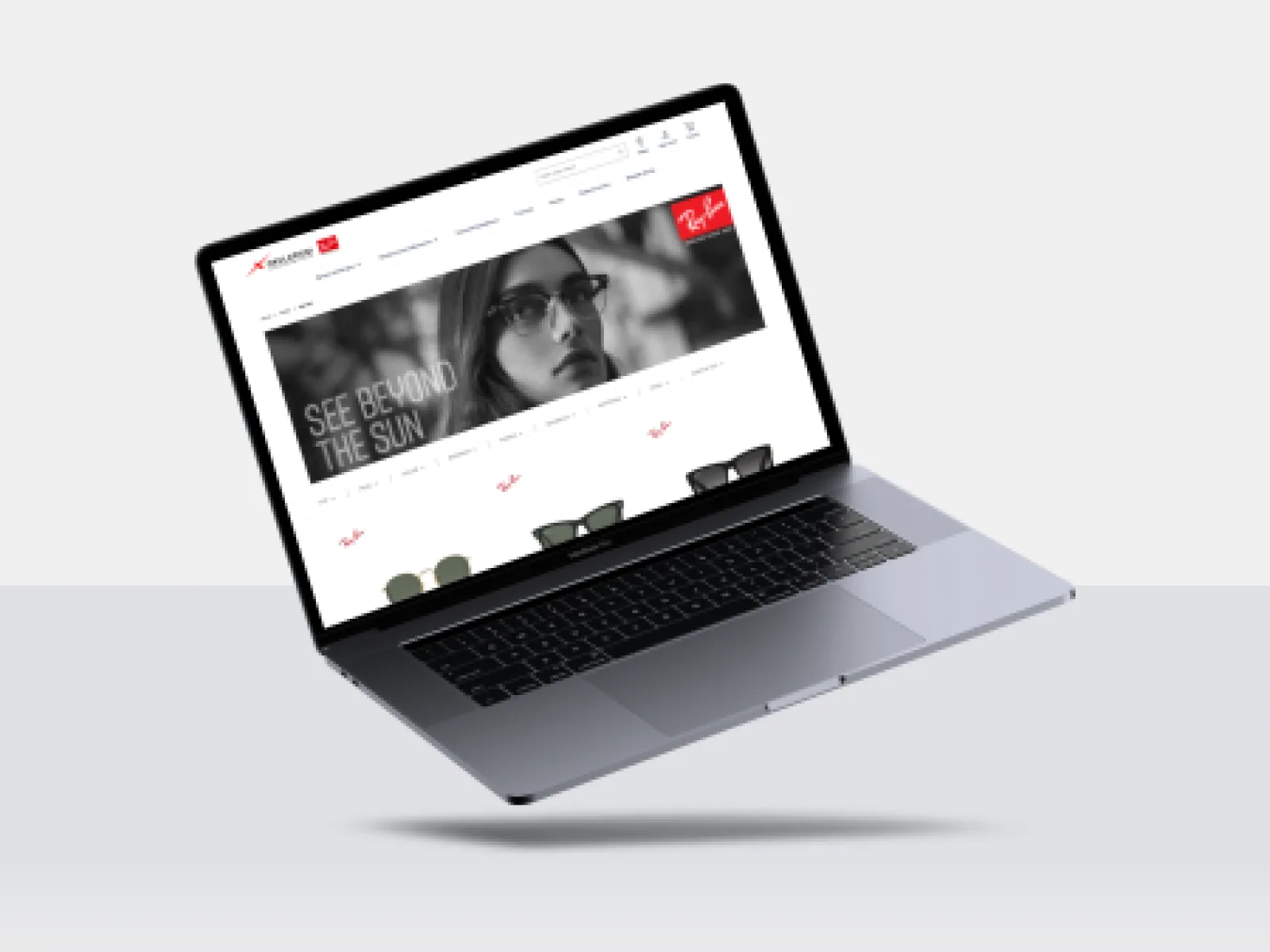 Laptop mockup showing an eyewear storefront homepage with sunglasses banner